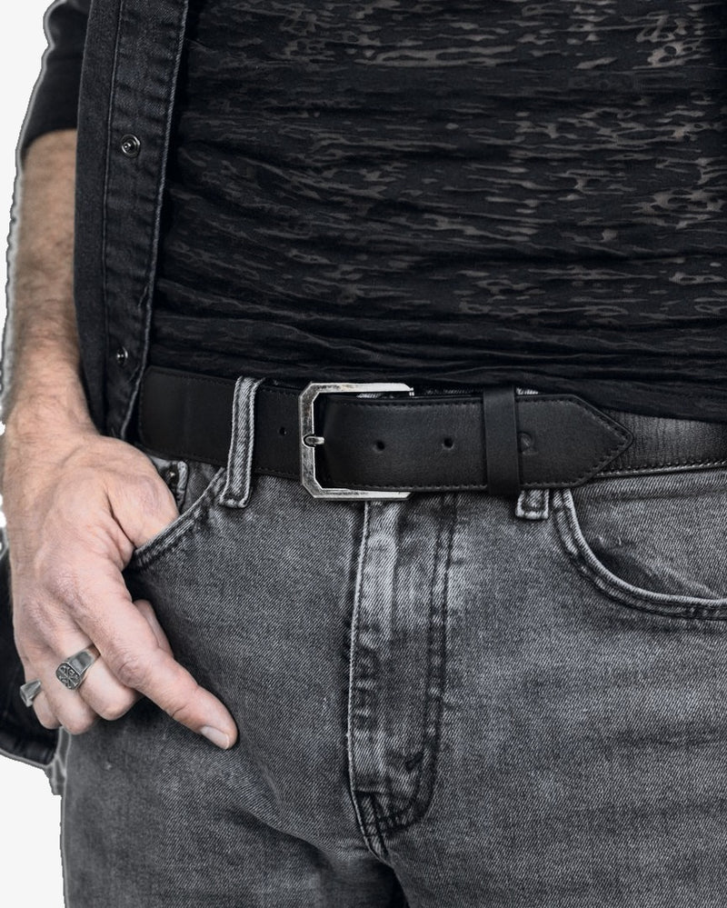 Praxis Belt in Onyx buckled at the waist.